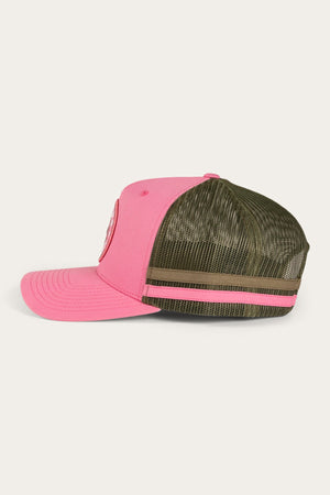 The side view of the Ringers Western McCoy Trucker Cap showcases a vibrant pink front panel adorned with a circular logo, complemented by a green mesh back and secured with a pink strap featuring a buckle. This design merges lively and earthy tones, providing both style and practicality.