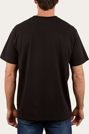 A person wearing a Ringers Western Princeton Loose Fit T-Shirt in plain black, made from 100% cotton, and blue jeans, shown from the back against a light background.