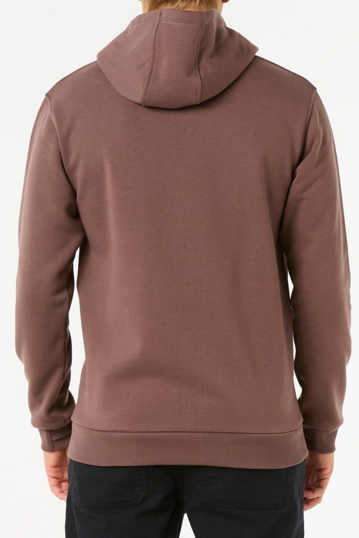A person is shown from the back against a plain light background wearing the Rip Curl Anti Series Search Base Hood, a brown bonded polar fleece hooded sweatshirt, paired with black pants.