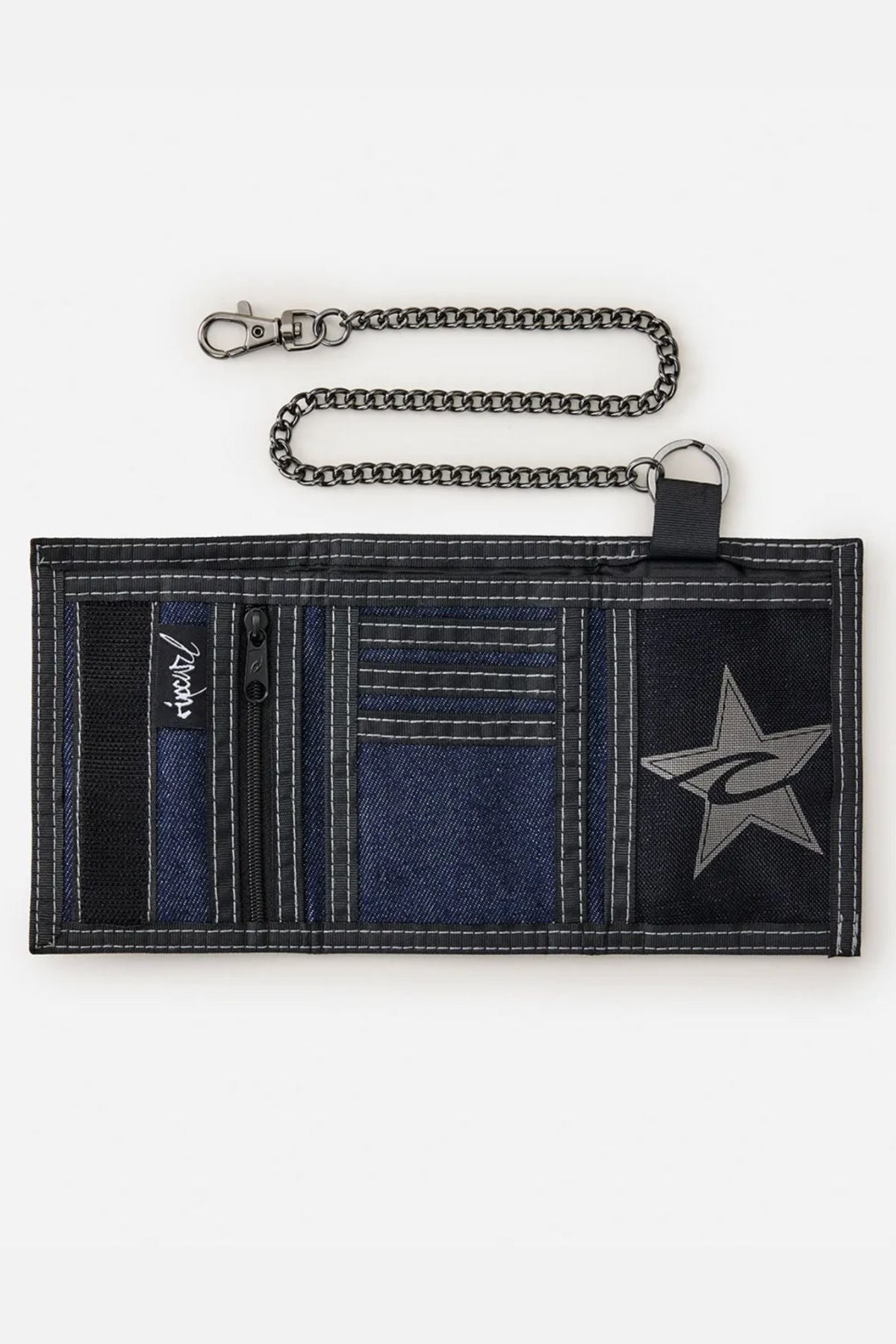 The Rip Curl Archive Denim Surf Wallet showcases blue and black cotton denim, multiple pockets, contrast stitching, a star and swirl design, plus a chain with claspβideal as your go-to surf wallet.