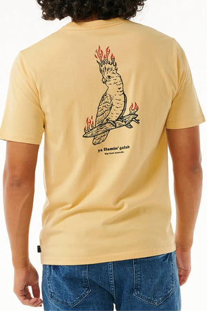 Someone in the Rip Curl Australia Fun Times Desto Tee sports a beige cotton jersey with a flaming cockatoo on a branch and "ya flamin' galah" printed on the back.