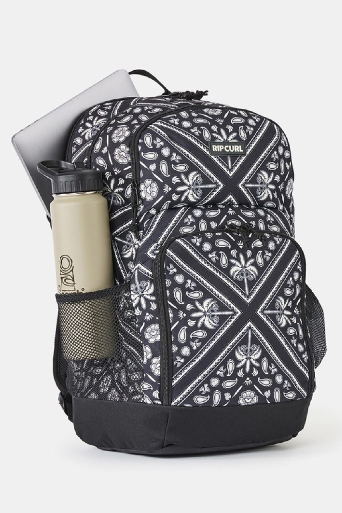 Black and white patterned Rip Curl Chaser 33L Backpack with a water bottle in the side mesh pocket.