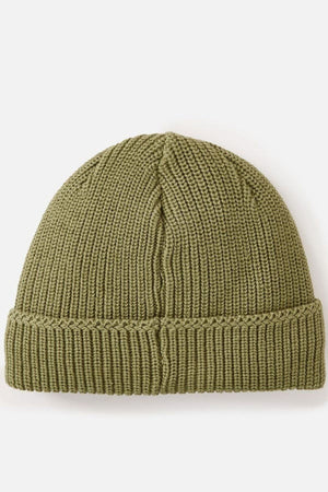 The Rip Curl Classic Surf Lined Reg Beanie is an olive green knitted cotton hat with a folded brim, perfect for outdoor adventures, shown flat on a white background.