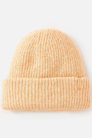 The Rip Curl Classic Surf Tall Beanie is a soft, beige knit with a wide folded brim and tall fit for ultimate insulation, shown on a plain white background.