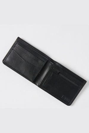 The Rip Curl Hi Rise RFID All Day Wallet is shown open on a white background, displaying the Rip Curl logo prominently. It features numerous card slots on the left side and a zippered pocket on the right, all equipped with RFID protection to ensure your essentials remain secure.
