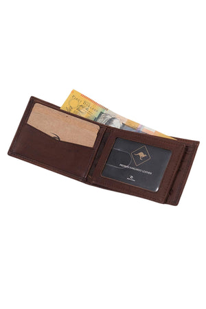 The Rip Curl K-Roo RFID Slim Wallet in brown kangaroo leather is shown open, revealing a card slot, a transparent ID window with a card inside, and a compartment holding several Australian fifty dollar notes.