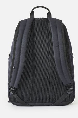 Back view of the black Rip Curl Crusher 30L Classic Backpack featuring padded shoulder straps and a mesh back panel.