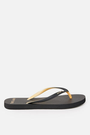 A single Rip Curl Premium Surf Bloom flip-flop sandal, featuring a flat sole and delicate yellow and black straps, is displayed against a plain white background. The word "Brazil" is visible on the heel area.