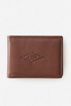 The Rip Curl Raw Energy RFID Slim Wallet is a slim buff cow leather wallet with visible stitching and an embossed geometric center design, shown closed against a plain white background.