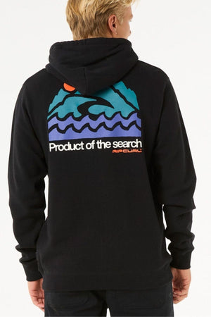 A person wears the Rip Curl Search Zip Thru Hood, a standard fit zip hoodie made from a cotton-polyester blend, with a colorful graphic of mountains, waves, an orange sun, and "Product of the search" and "Rip Curl" text on the back.