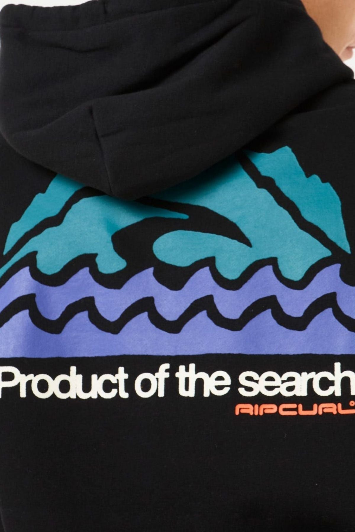 Person wearing a Rip Curl Search Zip Thru Hood, a standard fit hoodie made from a comfy cotton-polyester blend, featuring mountain and wave graphics with "Product of the search" and "Rip Curl" text on the back.