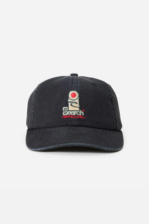 The Rip Curl Searchers SB Cap is a black unstructured cotton twill hat featuring an embroidered white figure and red dot above "Search Aircell" on the front, shown against a plain white background.