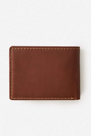 The Rip Curl Surf Revival RFID All Day Wallet is a closed brown leather wallet with visible edge stitching and RFID protection, displayed on a plain white background.