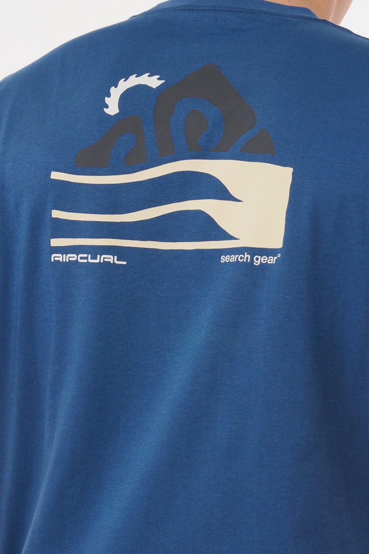 The back of the Rip Curl Vaporcool Search Range Tee, in blue, showcases a wave and mountain graphic with "RIP CURL" and "search gear" below—ideal moisture-wicking gear for adventure seekers.