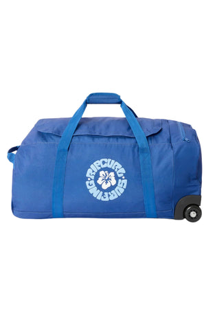 The Rip Curl Jupiter 80L Mixed Travel Bag is a large blue wheeled bag with two handles, a zipper, and a white "Ripcurl Surf Series" logo with a hibiscus flower—ideal for your next adventure.