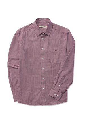 The RM Williams Classic Shirt, made from organic cotton, features a red and white micro gingham check pattern, long sleeves, a front chest pocket, and white buttons. It is displayed laid flat on a white background.