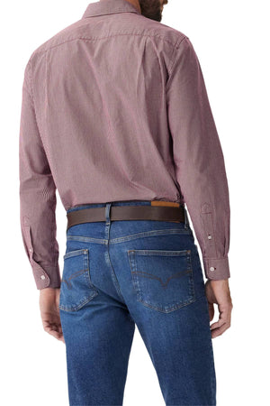 A man shown from the back wears a long-sleeve RM Williams Classic Shirt in red and white micro gingham organic cotton, tucked into blue jeans with a brown belt.
