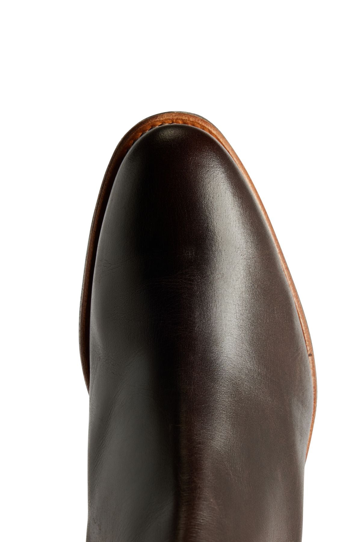 Close-up of the toe area of the RM Williams Comfort Lady Yearling Rubber Sole Boot, featuring polished brown leather and a light brown sole, made in Australia, photographed against a white background.
