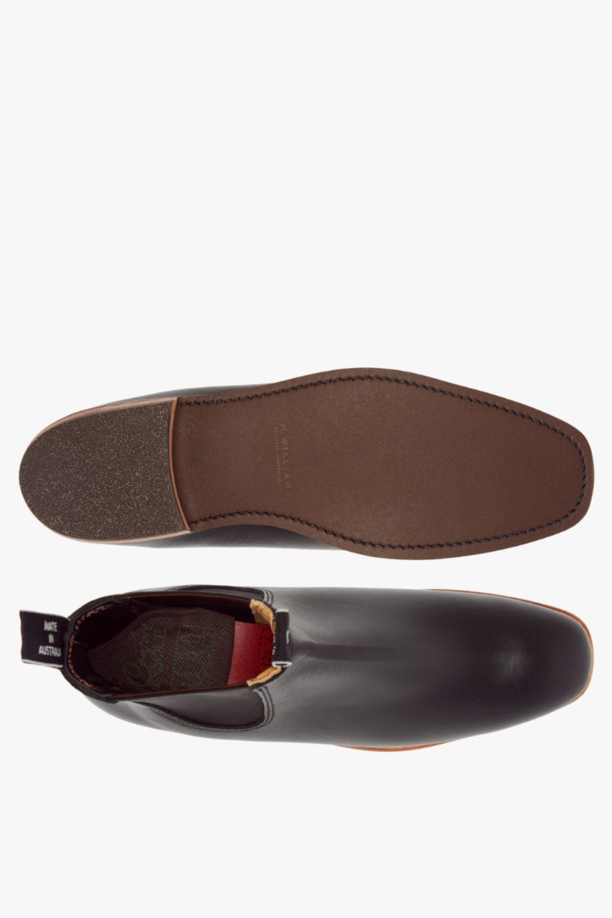 Top and bottom view of the RM Williams Erica Boot in black full-grain leather with a brown sole, elastic side panel, and heel pull tab on a plain white background.
