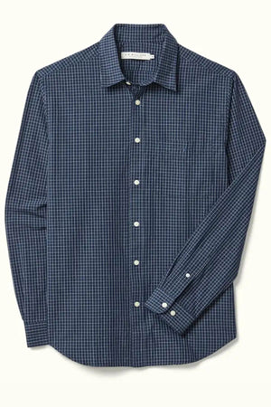 The RM Williams Kimberley Regular Poplin Shirt is a long-sleeve, blue and white checkered shirt with a single chest pocket, white buttons, and a regular fit for all-day comfort.