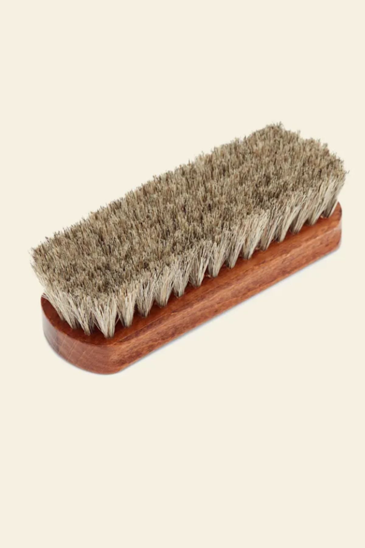 The RM Williams Medium Brush is a rectangular leather boot brush with densely packed, light brown horse hair bristles, displayed against a plain light background.