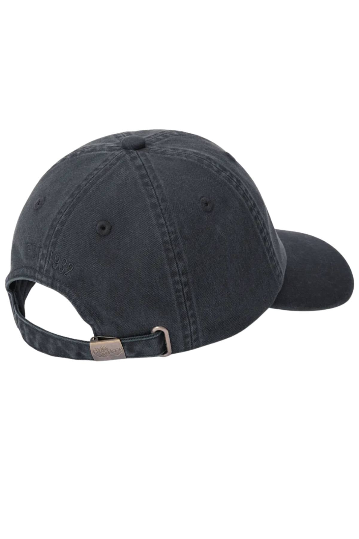 The RM Williams Mini Longhorn Twill Cap is a black denim baseball cap made from organic cotton, viewed from the back with a curved brim and an adjustable strap featuring a metal clasp.