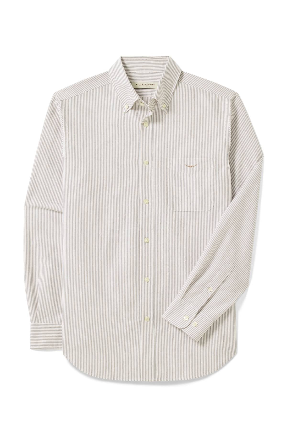 The RM Williams Regular Oxford Stripe Shirt is a regular fit, long-sleeve button-down with thin gray and white pinstripes, a left chest pocket, and cream-colored buttons.