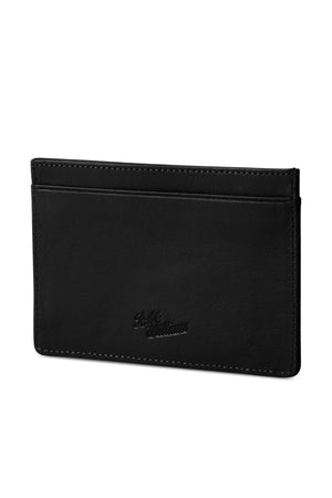 The RM Williams Singleton Vertical Card Holder is a slim, black, natural milled leather cardholder with visible stitching, an embossed "Belli Genuine Leather" logo, one open pocket, and RFID protection for secure minimalist storage.