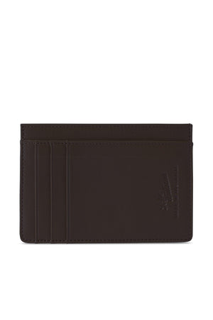 The RM Williams Singleton Vertical Card Holder is a handmade dark brown leather cardholder from Australia, with multiple card slots, a smooth texture, and an embossed logo on the bottom right corner.
