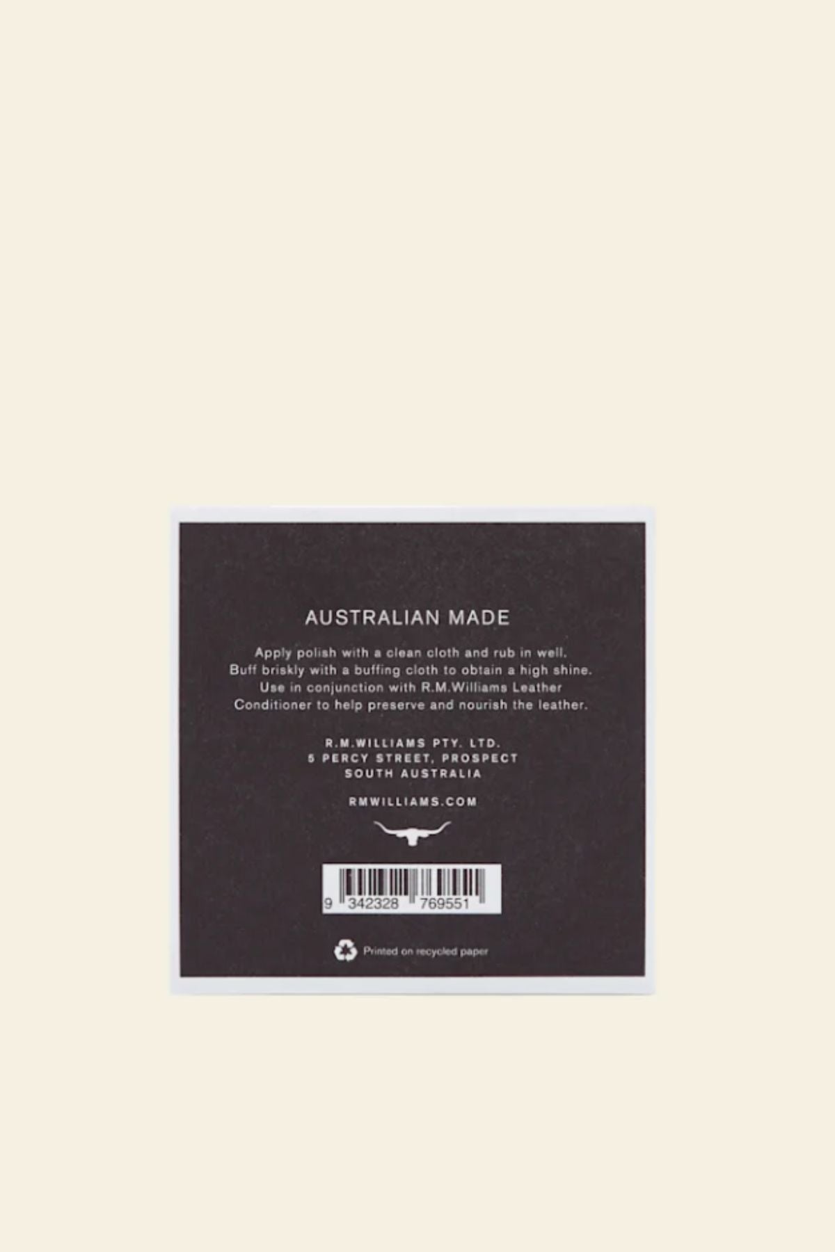 The RM Williams Stockmans Boot Polish care label, Australian made and printed on recycled paper, lists polish instructions, company information, a barcode, and care steps for leather goods.
