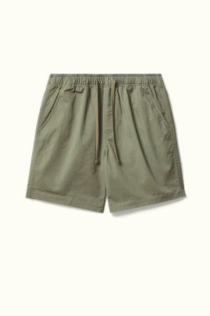 The RM Williams Washed Rugby Short in olive green offers a relaxed fit with breathable stretch twill, an elastic waistband, and side pockets—perfect for all-day comfort. Displayed against an off-white background.