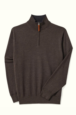The RM Williams Ernest 1/4 Zip Merino Knit, a brown sweater crafted from Australian extra-fine merino wool with ribbed collar, cuffs and hem, plus a leather pull-tab zipper, is shown laid flat on a light background.