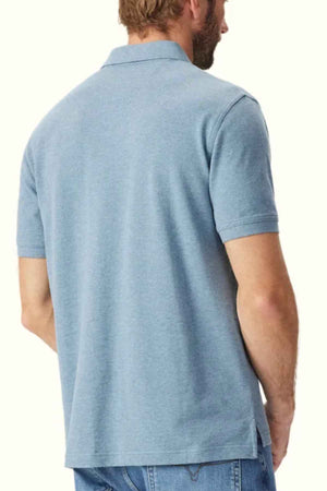 RM Williams Rod Polo in the colour Blue. Back angle of model wearing polo.