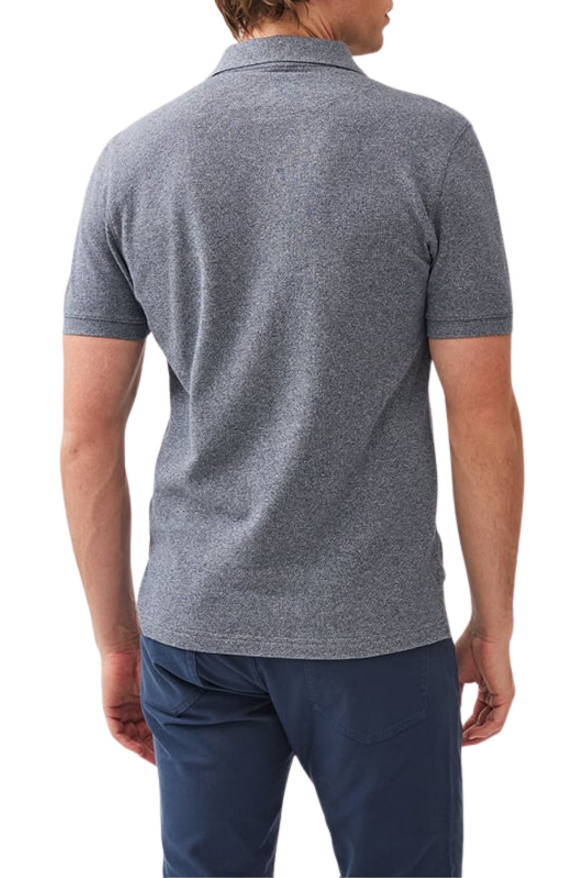 A man is seen from the back wearing a modern fit, short-sleeve Rodd & Gunn The Gunn Polo made from Australian cotton with dark blue pants, set against a white background.