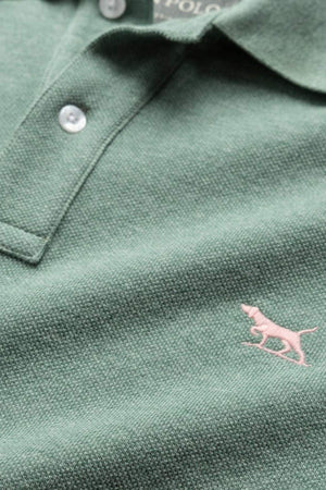 The Rodd & Gunn The Gunn Polo is a modern fit green shirt made from premium Australian cotton, featuring white buttons and a pink embroidered dog logo on the lower right side.