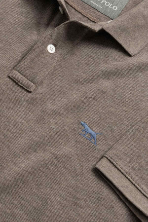 A close-up of the Rodd & Gunn The Gunn Polo in brown, made from soft Australian cotton, features a collar, a small blue embroidered dog logo on the chest, and a visible button at the neckline.