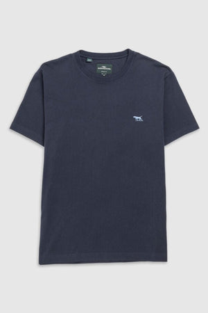 The Rodd & Gunn The Gunn T-Shirt, a solid navy blue short-sleeve tee crafted from luxurious Australian Cotton, is showcased on a light grey background. This comfortable garment boasts a round neck and features a small embroidered dog logo in contrasting lighter blue on the left chest side.