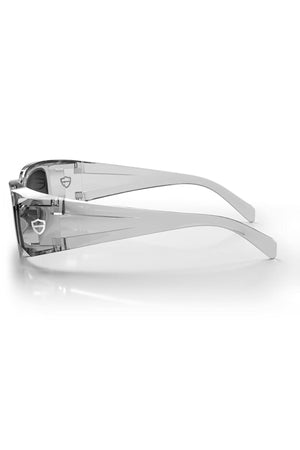 The SafeStyle Auras Graphite Frame Grey Polarised Lens sunglasses feature transparent rectangular frames and arms, a subtle shield logo by the hinge, and slightly tinted polarised lenses for stylish, reliable eye protection every day.