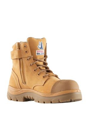 Steel Blue Argyle Zip Scuff Cap Boot Composite Toe in tan with brown laces features a side zipper, rugged sole, and a “Steel Blue” logo patch on the tongue. The boot is shown upright and angled to highlight its side and front.
