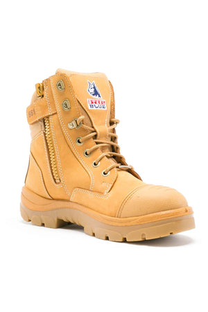 The Steel Blue Southern Cross Zip Boot is a tan leather, water-resistant work boot with a safety steel toe, side zipper, laces, rugged sole, and a Steel Blue logo patch—built for durability and superior protection.