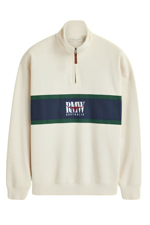 The RM Williams Classic RMW 1/4 Zip Sweatshirt is a cream pullover made from premium Australian cotton, featuring a navy and green horizontal chest stripe and "RMW AUSTRALIA" embroidered in white and red.