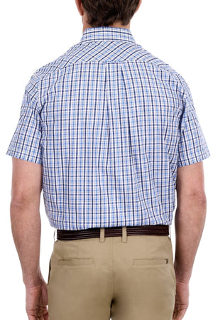 A man is shown from the back wearing the Thomas Cook Jude Short Sleeve Shirt, a blue and white plaid workwear top made from 100% cotton, tucked into beige pants.