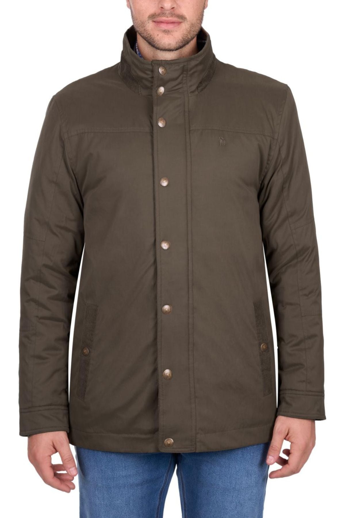A man in a dark olive-green Thomas Cook Matt Jacket with a high collar and blue jeans stands against a white background. The midweight puffer has two front pockets, metal snap buttons, and provides weather protection.