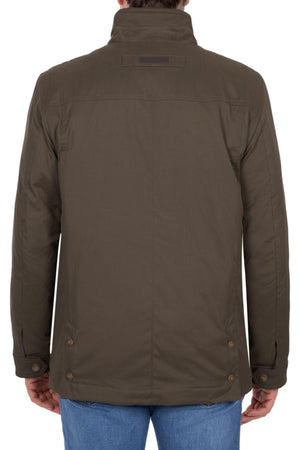 A person is shown from the back on a white background wearing a dark olive green Thomas Cook Matt Jacket with buttoned cuffs and blue jeans, highlighting stylish weather protection.