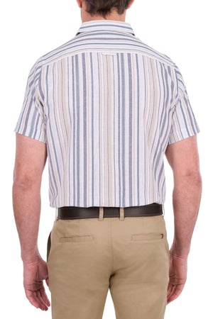 A man wearing the Thomas Cook Max Short Sleeve Shirt and khaki pants, viewed from the back against a white background.