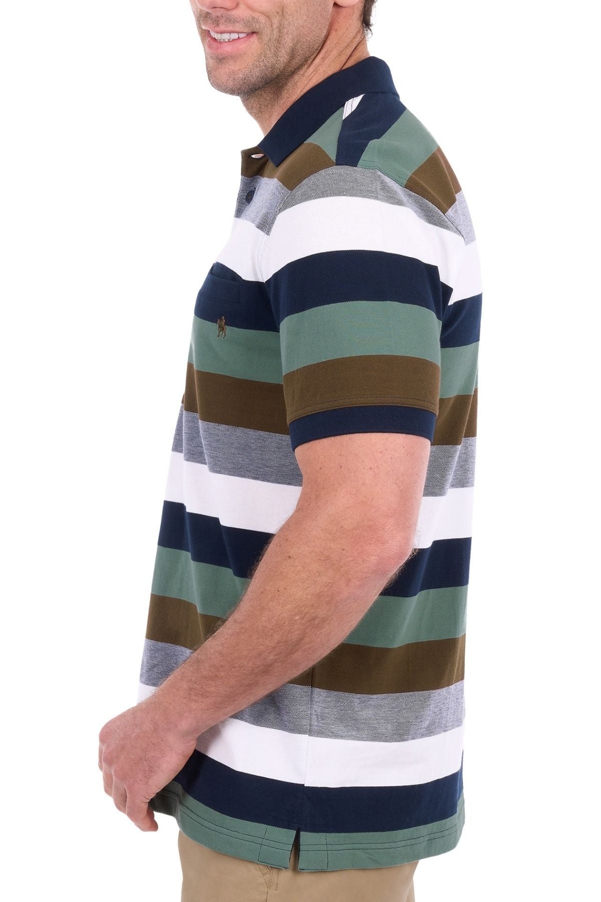 A man wearing the Thomas Cook Wayne Polo—crafted from 100% cotton pique with multi-colour stripes—and khaki pants stands sideways, smiling against a white background.