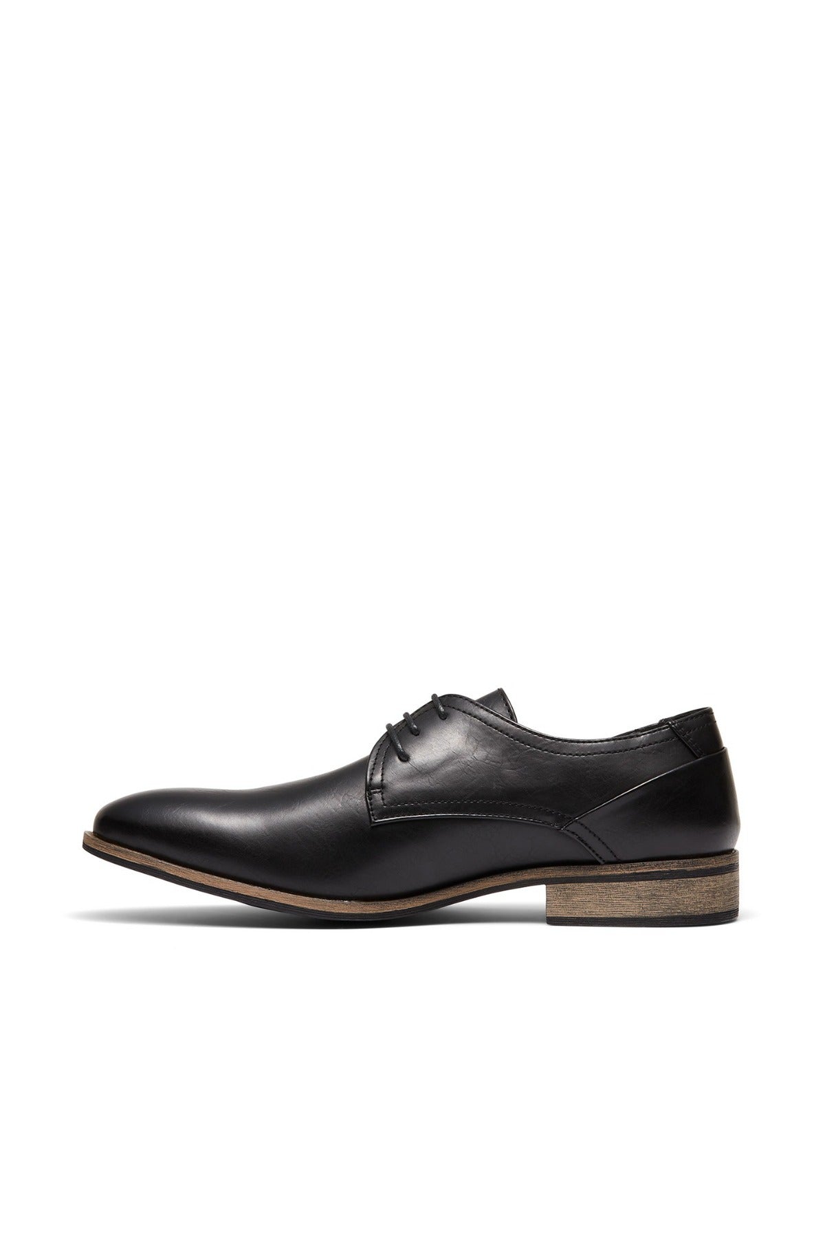 The UNcut Rhine Shoe in black features laces, a low heel, and a light brown sole. Displayed in side profile on a white background, it's an ideal pick for formal occasions.