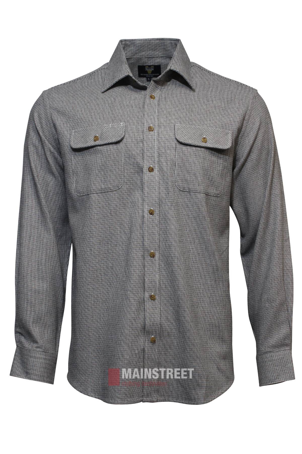 The Vonnella Double Pocket Shirt is a comfortable, long-sleeve gray shirt featuring buttoned chest pockets, a subtle checkered pattern, and the MAINSTREET logo at the image's bottom.