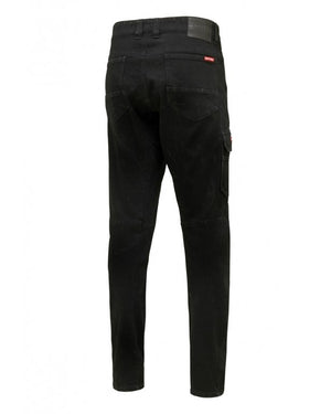 The Hard Yakka Dyneema Tough Jean, displayed on a white background, features a rear view of black slim-fit denim with multiple pockets—including two back and one right thigh pocket—stitching details, and a black label on the waistband. Designed for tear and abrasion resistance.