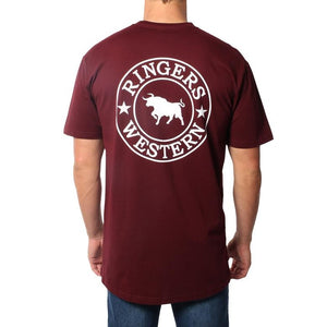 A person wearing the Ringers Western Signature Bull Original Fit T-Shirt, crafted from 100% cotton in maroon, with "RINGERS WESTERN" printed in white on the back. The text encircles a graphic of a bull and two stars. The person is standing facing away, and the background is white, showcasing this comfortable T-shirt from Ringers Western.